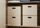 Beige Storage Bins for Home Organization on Wooden Shelf