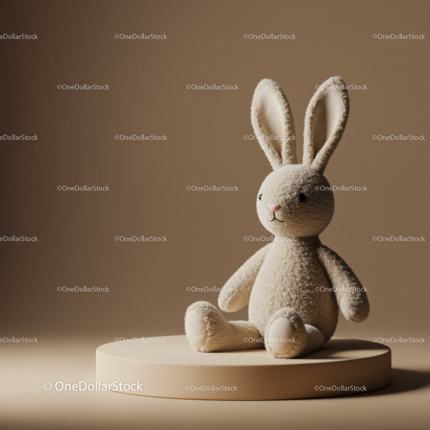Soft plush bunny toy seated on round pedestal
