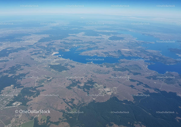 Aerial View of Lakes and Countryside with Forests and Hills
