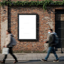Blank Advertising Board on Urban Brick Wall with Passersby