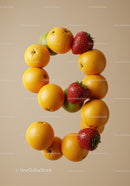 Number nine formed from fresh vibrant fruits on beige