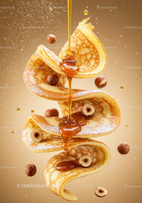 Golden pancakes with hazelnuts and flowing syrup