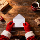 Santa Claus Holding Envelope on Rustic Wooden Table JPG Mockup Image preview