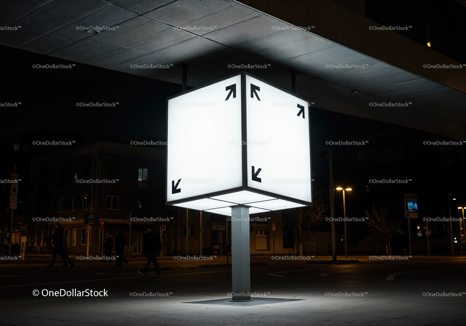 Illuminated cube street sign glowing in urban night