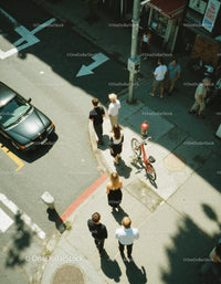 People Crossing Street on Busy Urban City Corner in Summer