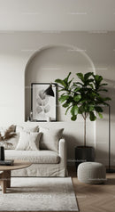 Cozy beige living room with large green plant and soft lighting
