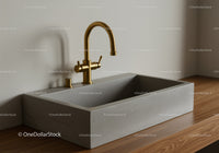 Modern Brass Faucet and Concrete Sink in Minimalist Kitchen