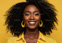 Smiling African Woman with Curly Hair and Bright Yellow Background