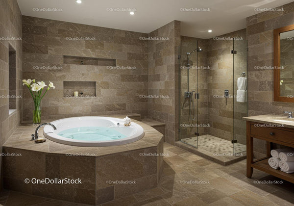Modern Bathroom with Bathtub and Glass Shower Enclosure in Beige Tones
