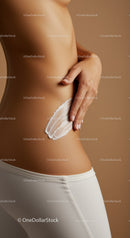 Woman Applying Moisturizer to Abdomen in Skincare Routine