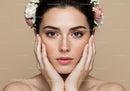 Close-up of a Young Woman with Freckles and Floral Crown on Beige Background