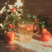 Peach Fruit with Glass Mug in Bright Garden Setting