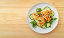 Grilled Salmon Fillets with Cucumber and Basil on White Plate