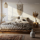 Minimalist bedroom with natural textures and warm sunlight