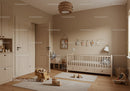 Warm and Cozy Nursery Room with Wooden Baby Crib and Playful Decor