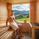 Man Relaxing in Sauna with Scenic Mountain View and Wooden Interior