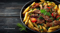 Hearty Penne Pasta with Beef Cherry Tomatoes and Fresh Herbs