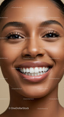Close-up of Smiling Woman with Radiant Skin and Bright Teeth