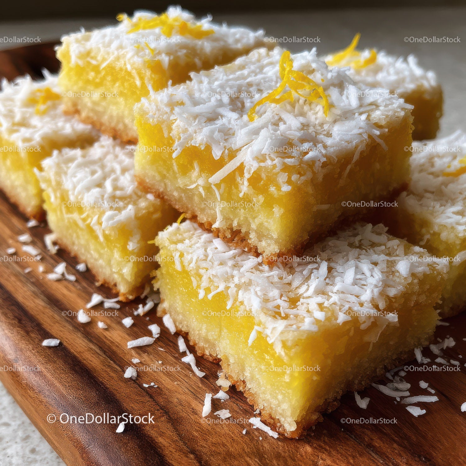 Bright Lemon Bars with Coconut Topping on Wooden Board