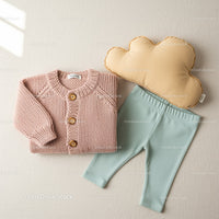 Cozy baby knit cardigan with soft leggings and pillow