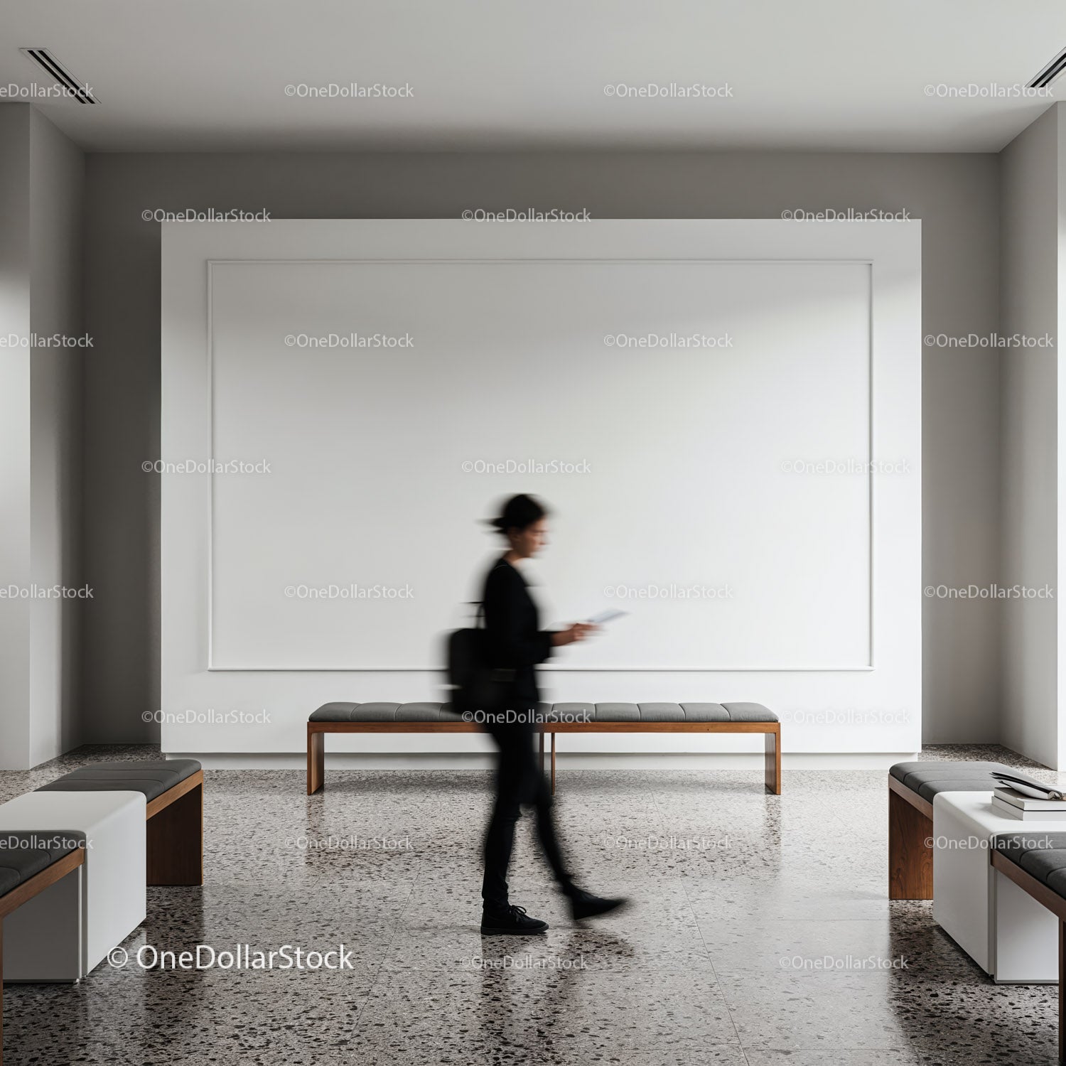 Person Walking Through Minimalist Modern Lobby
