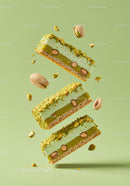 Floating pistachio dessert bars with nuts and crumbs