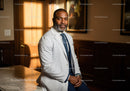 Professional African American Male Doctor in Medical Office with Stethoscope