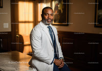 Professional African American Male Doctor in Medical Office with Stethoscope