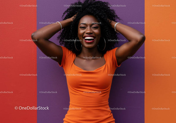 Vibrant Woman Smiling in Bright Orange Top Against Colorful Wall