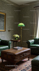 Classic living room with green leather sofas and vintage lamp