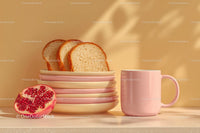 Fresh Pomegranate Half and Sliced Bread with Pink Mug in Breakfast Setting