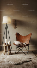 Cozy leather butterfly chair with soft cushions indoors
