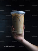 Chilled Iced Coffee in Clear Plastic Cup with Straw on Dark Background