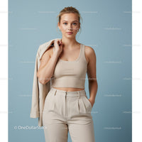 Stylish Young Woman in Beige Tank Top and High-Waisted Pants