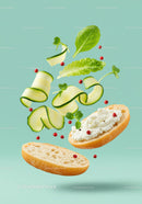 Fresh cucumber and cream cheese sandwich ingredients floating
