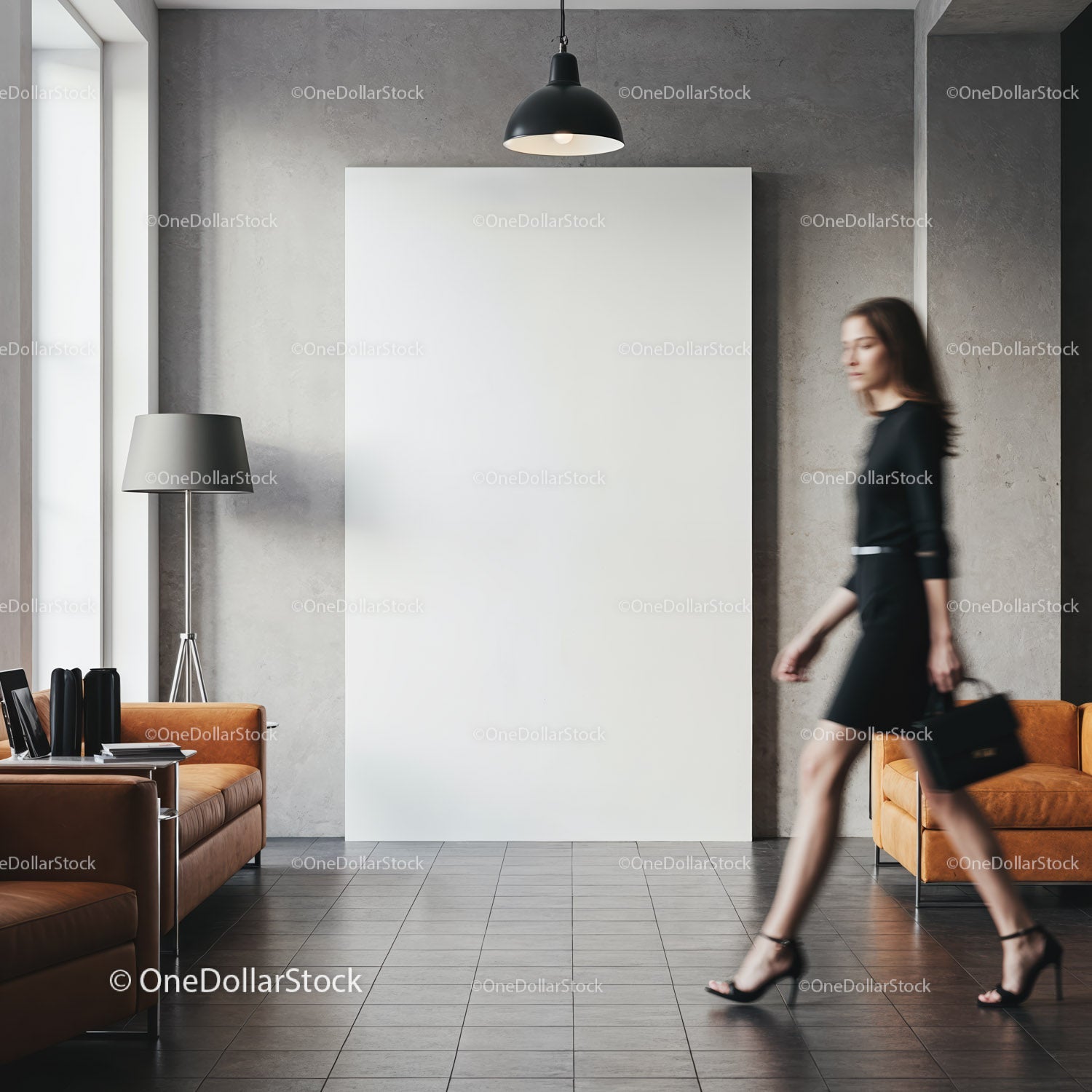 Woman walking past blank canvas in modern living room