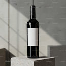 Minimalist wine bottle with blank label on concrete block