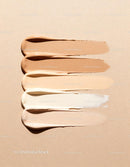 Various shades of creamy liquid foundation swatches