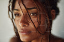 Close-Up of Woman with Wet Hair and Intense Expression