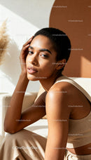 Calm young woman enjoying soft natural light