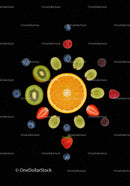Fresh mixed fruits arranged on black background