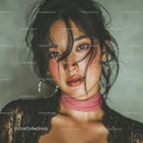 Close-Up of a Woman with Dark Hair and Golden Jewelry in Glamorous Style