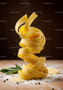 Close up of fresh fettuccine pasta with flour dust