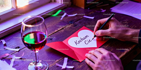 Handwriting a Romantic Valentine Card Near a Window