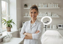 Professional Female Doctor in White Coat in Modern Medical Clinic