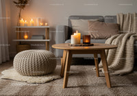 Cozy living room with candles and knitted decor