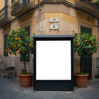 Urban street corner with blank advertising billboard and orange trees