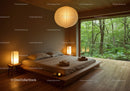 Minimalist bedroom with forest view and warm lighting