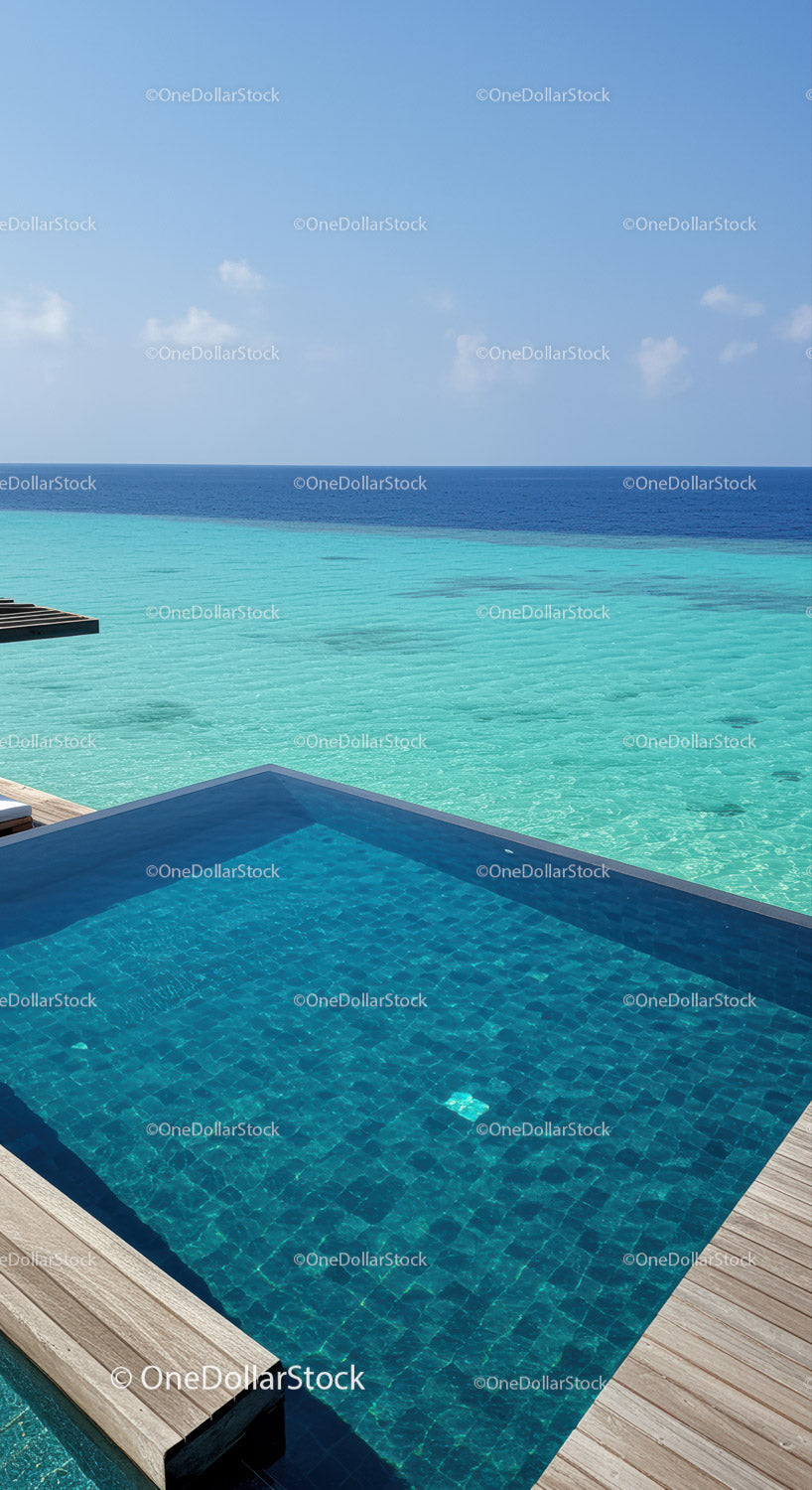 Luxury Infinity Pool with Ocean View and Wooden Deck