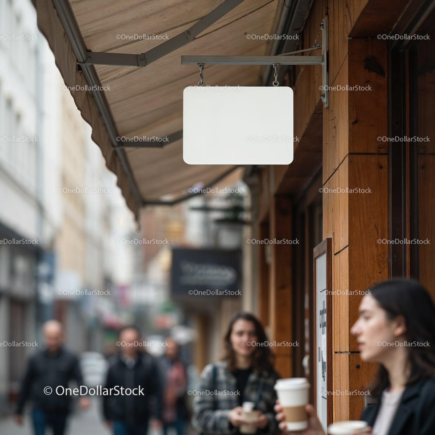 Blank Shop Sign Hanging Over Urban Café Street